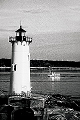 Portsmouth Harbor Lighthouse Guiding Lobster Boat